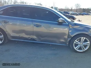 2013 Volkswagen Passat SE w/Sunroof with VIN 1VWBM7A30DC125919, listed as a IAAI auction lot 41759051 with 112,952 mi miles. Bid and sale history available at carsss.com. Image 6.