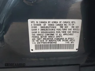 2004 Honda Pilot EX with VIN 2HKYF184X4H590442, listed as a IAAI auction lot 40968680 with 224,892 mi miles. Bid and sale history available at carsss.com. Image 9.