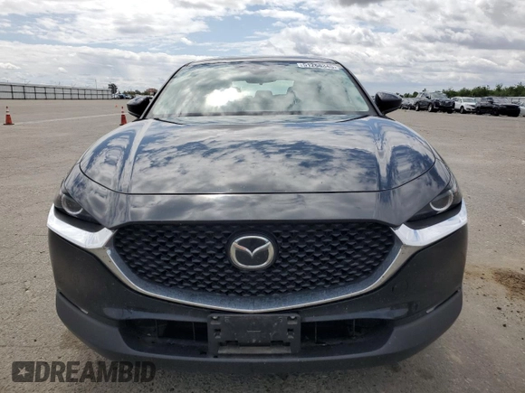 2023 Mazda CX-30 S with VIN 3MVDMBAM7PM555455, listed as a Copart auction lot 51268345 with 34,552 mi miles and Salvage Title. Bid and sale history available at carsss.com. Image 5.