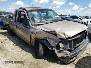 1999 Ford F-250 XL with VIN 1FTNX20LXXEB62268, listed as a Copart auction lot 61138922 with 456,688 mi miles and Salvage title. Bid and sale history available at DreamBid. Image 1.