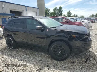2020 Jeep Cherokee Trailhawk Elite with VIN 1C4PJMBN2LD546324, listed as a Copart auction lot 60826494 with 79,625 mi miles and Salvage title. Bid and sale history available at DreamBid. Image 4.