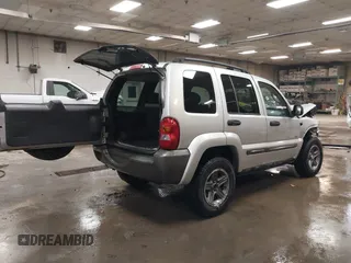 2004 Jeep Liberty Sport with VIN 1J4GL48K44W182897, listed as a IAAI auction lot 40768956 with 241,550 mi miles and . Bid and sale history available at DreamBid. Image 4.