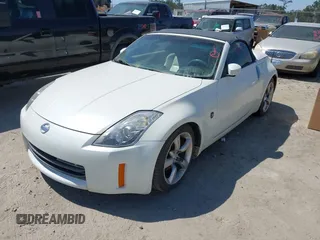 2006 Nissan 350Z Touring with VIN JN1AZ36A96M452478, listed as a IAAI auction lot 41843993 with 211,567 mi miles. Bid and sale history available at carsss.com. Image 2.