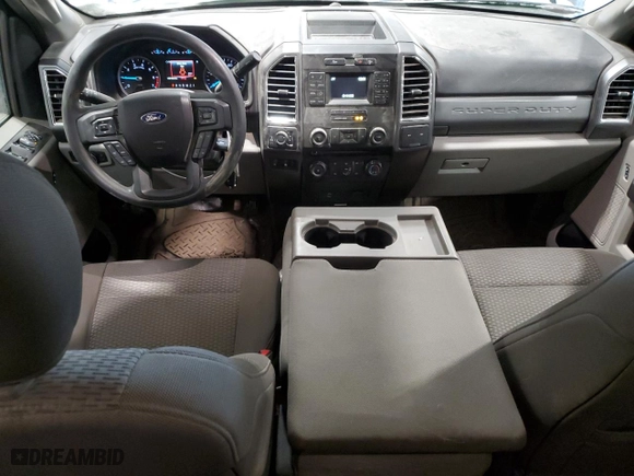 2018 Ford Super Duty F-250 SRW XL with VIN 1FT7X2B61JEB71609, listed as a Copart auction lot 45167395 with 107,493 mi miles and Salvage Title. Bid and sale history available at carsss.com. Image 8.