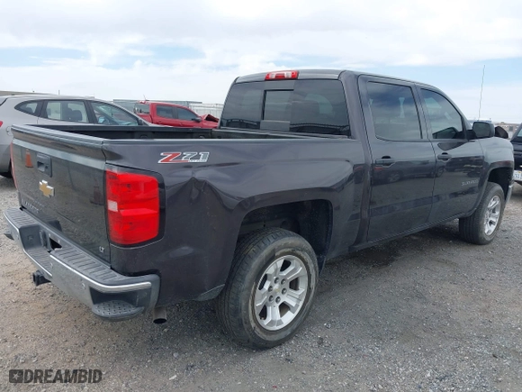 2014 Chevrolet Silverado 1500 LT with VIN 3GCUKREC7EG561639, listed as a IAAI auction lot 42020364 with 154,785 mi miles. Bid and sale history available at carsss.com. Image 4.