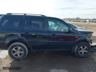 2007 Honda Pilot EX-L with VIN 5FNYF28557B027087, listed as a IAAI auction lot 41356244 with 183,923 mi miles. Bid and sale history available at carsss.com. Image 14.