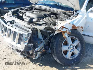 2012 Jeep Grand Cherokee Laredo with VIN 1C4RJFAGXCC224138, listed as a IAAI auction lot 41736375 with 133,383 mi miles. Bid and sale history available at carsss.com. Image 6.