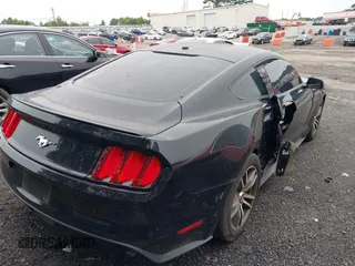 2016 Ford Mustang EcoBoost with VIN 1FA6P8TH2G5293215, listed as a IAAI auction lot 42032241 with 96,960 mi miles and . Bid and sale history available at DreamBid. Image 6.