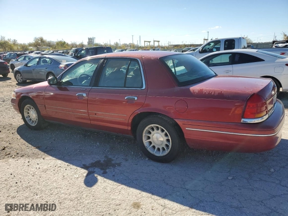 1998 Ford Crown Victoria LX with VIN 2FAFP74W4WX118422, listed as a Copart auction lot 78716184 with 70,214 mi miles and Salvage Title. Bid and sale history available at carsss.com. Image 2.
