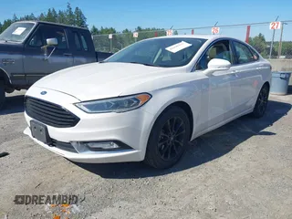 2017 Ford Fusion SE z VIN 3FA6P0HD3HR132779, wystawiony jako IAAI lot #42690212 z przebiegiem 165 293 mil mil oraz . Historia ofert i sprzedaży dostępna na DreamBid. Obrazek 2.