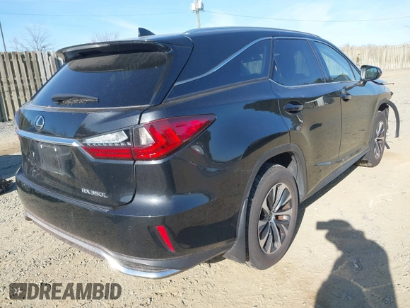 2022 Lexus RX with VIN JTJHZKFA7N2037057, listed as a IAAI auction lot 41804899 with 157,549 mi miles. Bid and sale history available at carsss.com. Image 4.
