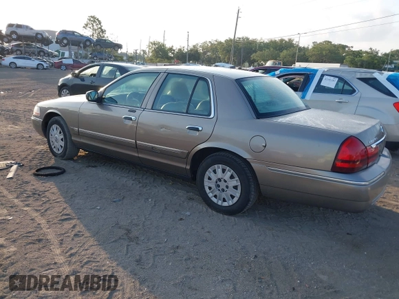 2004 Mercury Grand Marquis GS with VIN 2MEFM74WX4X696703, listed as a IAAI auction lot 42171970 with 149,556 mi miles and . Bid and sale history available at DreamBid. Image 3.
