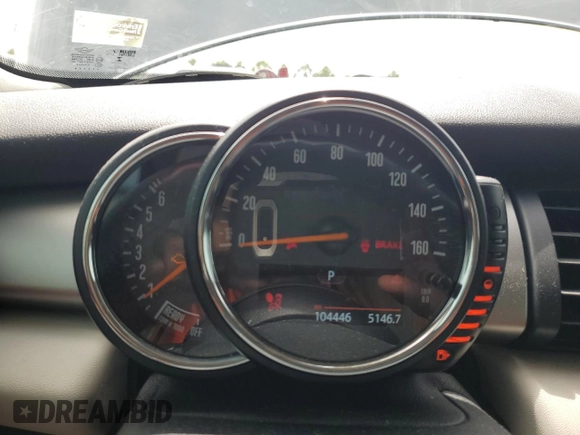 2014 MINI Hardtop with VIN WMWXM5C51ET934047, listed as a Copart auction lot 63039335 with 104,446 mi miles and Salvage title. Bid and sale history available at DreamBid. Image 9.