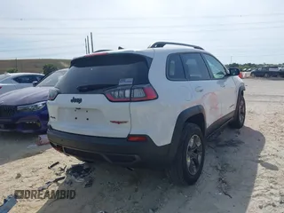 2019 Jeep Cherokee Trailhawk Elite with VIN 1C4PJMBN3KD487461, listed as a IAAI auction lot 41869751 with 91,197 mi miles and . Bid and sale history available at DreamBid. Image 4.