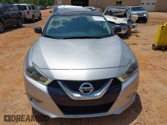 2016 Nissan Maxima SR with VIN 1N4AA6AP7GC389606, listed as a IAAI auction lot 42451614 with 114,957 mi miles and . Bid and sale history available at DreamBid. Image 12.