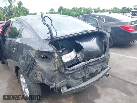 2016 Scion iA z VIN 3MYDLBZV5GY133972, wystawiony jako IAAI lot #42260164 z przebiegiem 156 981 mil mil oraz . Historia ofert i sprzedaży dostępna na DreamBid. Obrazek 12.