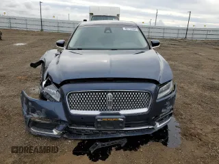 2017 Lincoln Continental Reserve with VIN 1LN6L9NC2H5614888, listed as a Copart auction lot 82712404 with 104,893 mi miles and Salvage Title. Bid and sale history available at DreamBid. Image 5.