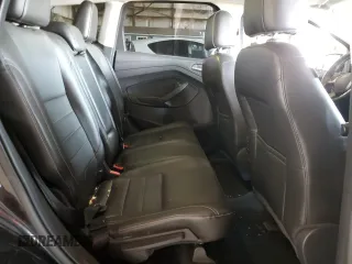 2015 Ford Escape Titanium with VIN 1FMCU0J91FUA17918, listed as a Copart auction lot 64525025 with 130,095 mi miles and Salvage title. Bid and sale history available at DreamBid. Image 10.