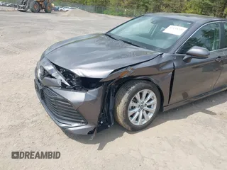 2019 Toyota Camry LE with VIN 4T1B11HK9KU229110, listed as a IAAI auction lot 42133332 with 17,541 mi miles and . Bid and sale history available at DreamBid. Image 6.