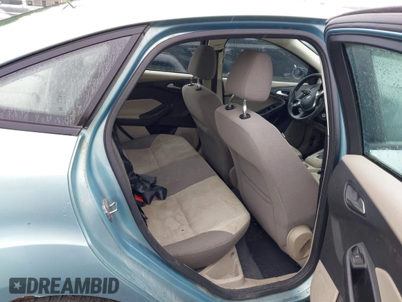 2012 Ford Focus SE with VIN 1FAHP3F21CL226033, listed as a IAAI auction lot 42368786 with 168,061 mi miles and . Bid and sale history available at DreamBid. Image 8.