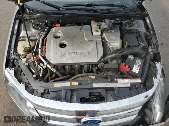 2012 Ford Fusion Hybrid z VIN 3FADP0L33CR211609, wystawiony jako Copart lot #60873005 z przebiegiem 144 474 mil mil oraz Szkoda całkowita • Salvage title. Historia ofert i sprzedaży dostępna na DreamBid. Obrazek 11.