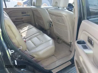 2006 Honda Pilot EX with VIN 5FNYF28466B049833, listed as a IAAI auction lot 41939721 with 238,995 mi miles and . Bid and sale history available at DreamBid. Image 8.