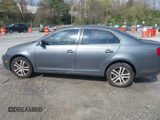 2005 Volkswagen Jetta Sedan 2.5L with VIN 3VWSG71K35M617763, listed as a IAAI auction lot 41963065 with 200,915 mi miles. Bid and sale history available at carsss.com. Image 14.