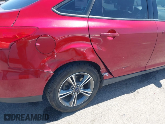2017 Ford Focus SE with VIN 1FADP3FE3HL206074, listed as a IAAI auction lot 42594911 with 143,814 mi miles and . Bid and sale history available at DreamBid. Image 6.