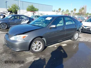 2004 Toyota Camry LE with VIN 4T1BF30K94U577260, listed as a IAAI auction lot 41906287 with 68,499 mi miles. Bid and sale history available at carsss.com. Image 18.