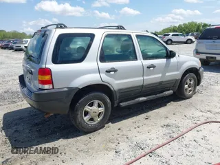 2003 Ford Escape XLS Popular z VIN 1FMYU02183KC05213, wystawiony jako IAAI lot #41955134 z przebiegiem 305 524 mil mil oraz . Historia ofert i sprzedaży dostępna na DreamBid. Obrazek 4.