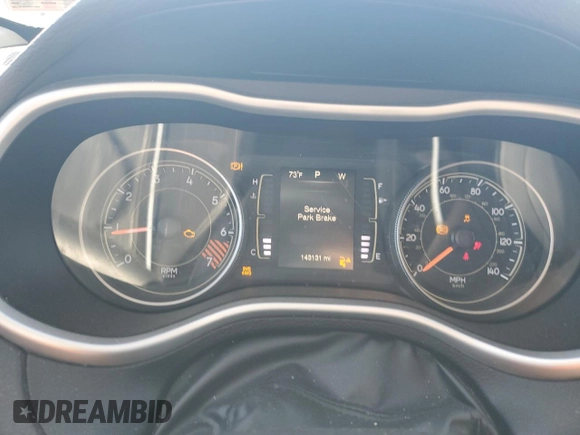 2015 Jeep Cherokee Sport with VIN 1C4PJMAB7FW749757, listed as a Copart auction lot 50165345 with 143,131 mi miles and Salvage Title. Bid and sale history available at carsss.com. Image 9.