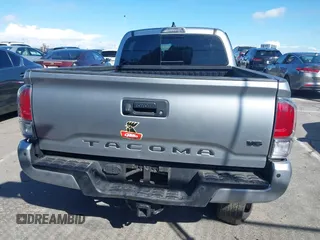 2022 Toyota Tacoma SR5 with VIN 3TMDZ5BN6NM122590, listed as a IAAI auction lot 41714578 with 56,472 mi miles and . Bid and sale history available at DreamBid. Image 16.