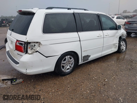 2007 Honda Odyssey EX-L z VIN 5FNRL38737B072789, wystawiony jako IAAI lot #41203148 z przebiegiem 156 828 mil mil oraz . Historia ofert i sprzedaży dostępna na DreamBid. Obrazek 4.