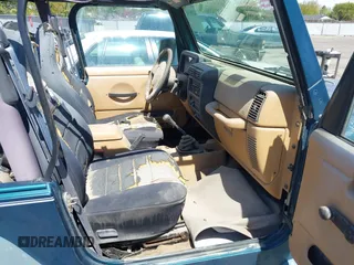 1997 Jeep Wrangler Sport with VIN 1J4FY19S4VP539226, listed as a IAAI auction lot 42096161 with 1 mi miles. Bid and sale history available at carsss.com. Image 5.