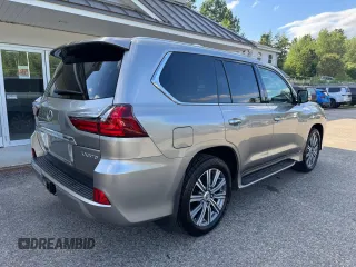 2016 Lexus LX 570 with VIN JTJHY7AX4G4198811, listed as a Copart auction lot 64898475 with 107,759 mi miles and Clean title. Bid and sale history available at DreamBid. Image 4.