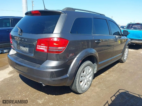 2018 Dodge Journey SE with VIN 3C4PDCAB1JT496404, listed as a IAAI auction lot 41646706 with 140,248 mi miles. Bid and sale history available at carsss.com. Image 4.