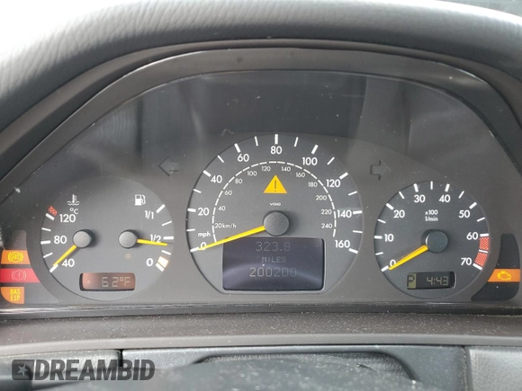 2002 Mercedes-Benz E-Class with VIN WDBJF65J42B471548, listed as a Copart auction lot 79754414 with 200,200 mi miles and Salvage Title. Bid and sale history available at carsss.com. Image 9.