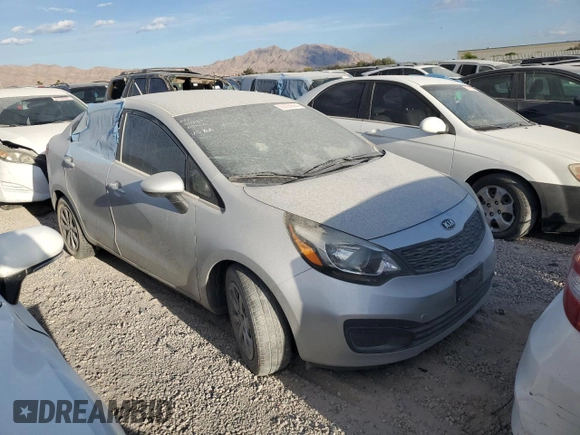 2015 Kia Rio LX with VIN KNADM4A3XF6436038, listed as a Copart auction lot 85834574 with 66,085 mi miles and Salvage Title. Bid and sale history available at carsss.com. Image 4.