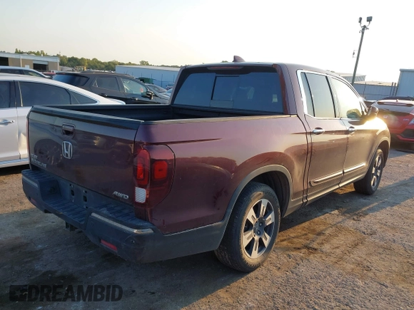 2017 Honda Ridgeline RTL-E with VIN 5FPYK3F74HB029959, listed as a IAAI auction lot 40530840 with 95,596 mi miles and . Bid and sale history available at DreamBid. Image 4.