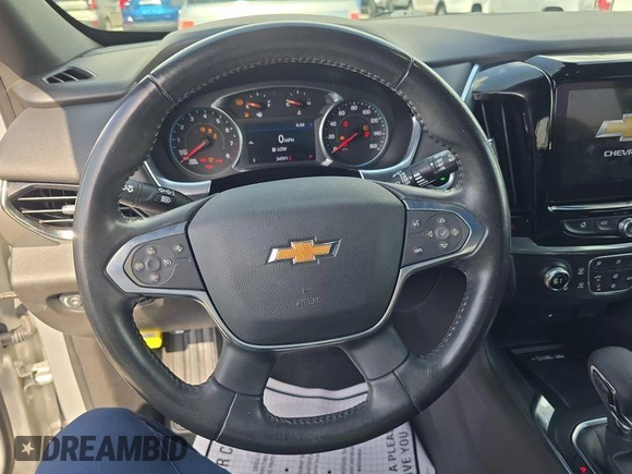 2022 Chevrolet Traverse LT Cloth z VIN 1GNEVGKW4NJ169495, wystawiony jako IAAI lot #42566410 z przebiegiem 34 588 mil mil oraz . Historia ofert i sprzedaży dostępna na DreamBid. Obrazek 7.