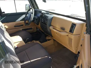 1997 Jeep Wrangler Sahara with VIN 1J4FY49S4VP523156, listed as a IAAI auction lot 42046797 with 193,408 mi miles. Bid and sale history available at carsss.com. Image 5.