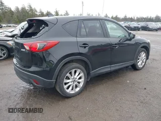 2013 Mazda CX-5 Grand Touring with VIN JM3KE2DEXD0124270, listed as a IAAI auction lot 41942120 with 109,087 mi miles. Bid and sale history available at carsss.com. Image 4.