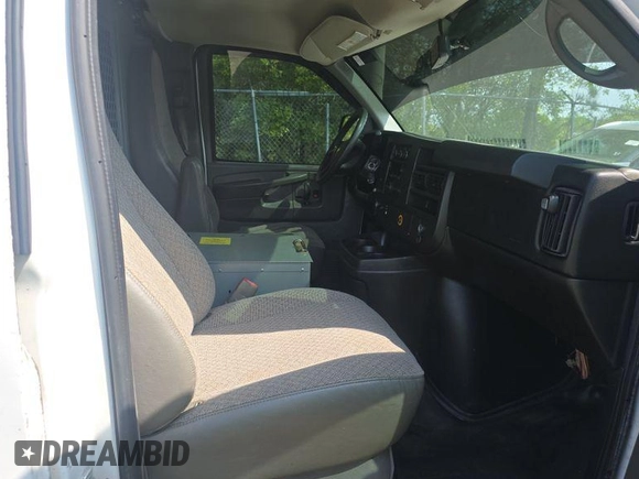 2014 Chevrolet Express Cargo Van with VIN 1GCWGFCA7E1187199, listed as a IAAI auction lot 41944277 with 269,727 mi miles. Bid and sale history available at carsss.com. Image 1.
