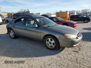 2002 Ford Taurus z VIN 1FAHP59S82A188995, wystawiony jako Copart lot #82141704 z przebiegiem 89 153 mil mil oraz Szkody całkowita. Historia ofert i sprzedaży dostępna na DreamBid. Obrazek 4.