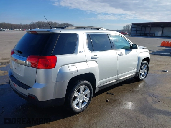 2013 GMC Terrain SLE z VIN 2GKALSEK9D6120964, wystawiony jako IAAI lot #41880269 z przebiegiem 169 579 mil mil oraz . Historia ofert i sprzedaży dostępna na DreamBid. Obrazek 4.