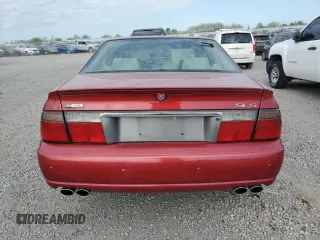 2004 Cadillac Seville Luxury SLS z VIN 1G6KS54YX4U100916, wystawiony jako Copart lot #54471295 z przebiegiem 59 059 mil mil oraz Szkody całkowita. Historia ofert i sprzedaży dostępna na DreamBid. Obrazek 6.