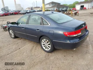 2007 Hyundai Azera SE with VIN KMHFC46F47A195122, listed as a IAAI auction lot 42202807 with 70,694 mi miles and . Bid and sale history available at DreamBid. Image 3.