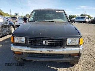 1995 Honda Passport z VIN 4S6CM58V0S4425974, wystawiony jako Copart lot #73371724 z przebiegiem 161 173 mil mil oraz Tytuł czysty. Historia ofert i sprzedaży dostępna na DreamBid. Obrazek 5.