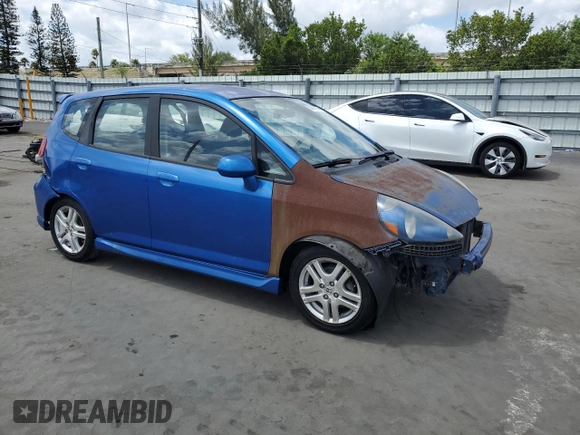 2007 Honda Fit Sport with VIN JHMGD38687S014318, listed as a Copart auction lot 53992935 with 59,504 mi miles and Clean title. Bid and sale history available at DreamBid. Image 4.