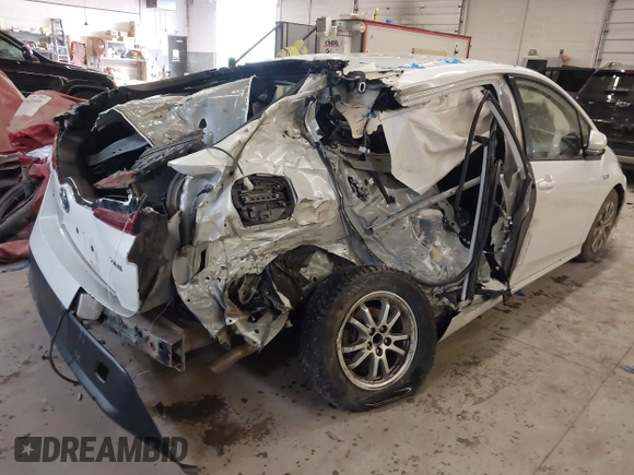 2022 Toyota Prius LE with VIN JTDKAMFP4N3223259, listed as a IAAI auction lot 41975054 with 49,558 mi miles and . Bid and sale history available at DreamBid. Image 4.
